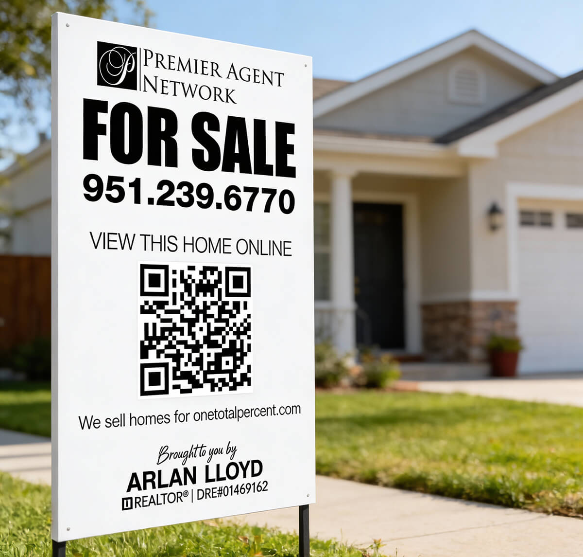 Home for sale yard sign in front yard in Turlock, CA
